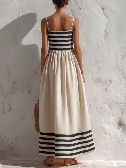 Ortensia — Vestido largo de rayas negras y beige con tirantes finos.